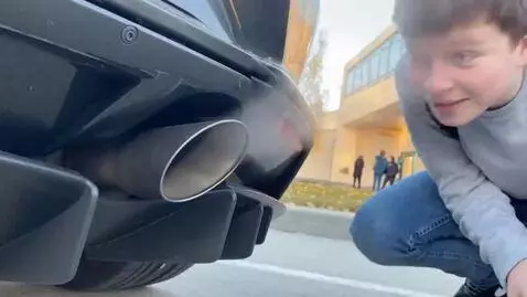 AI Video from prompt: This guy ran up to a cool car and started suckin
