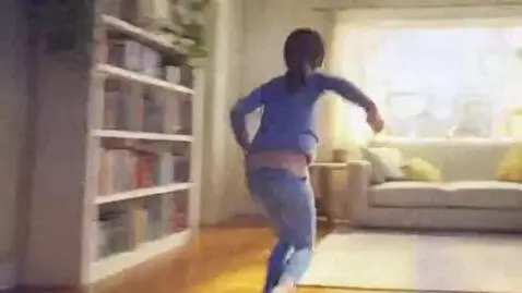 AI Video from prompt: The girl gets up, starts running and bumps her n