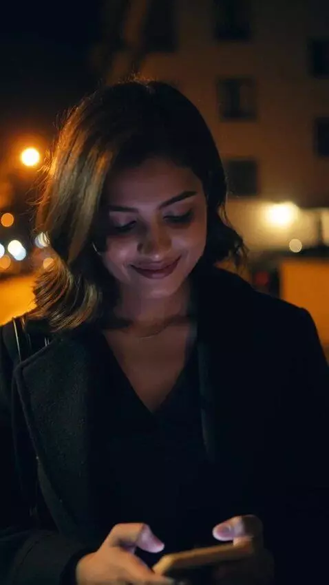 AI Video from prompt: cinematic night scene outside a dimly lit apartm