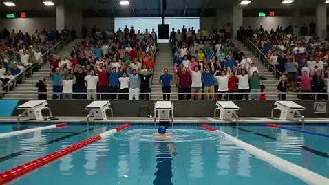 AI Video from prompt: All the spectators sitting in the stands in a ro