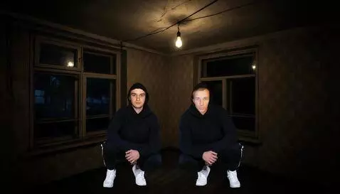 AI Video from prompt: The camera is not moving, the guys in the frame 