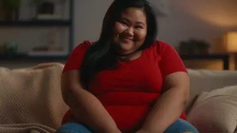 AI Video from prompt: A significantly overweight (approximately 160 kg