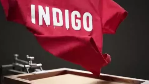 AI Video from prompt: A cinematic action shot of a vibrant red round-n