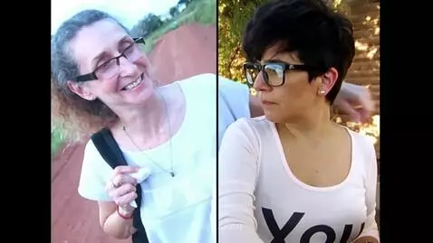 AI Video from prompt: The woman with long hair hugs the woman with sho