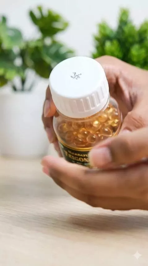 AI Video from prompt: “A hand picks up a bottle of Habbatussauda capsu