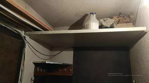 AI Video from prompt: from a shelf near the ceiling, the terrible, ter