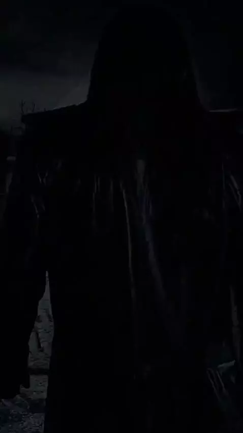 AI Video from prompt: *starts walking the graveyard. With haunting mus