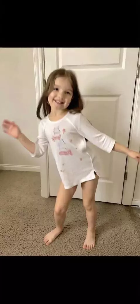 AI Video from prompt: Person is in their room, they do a short dance.