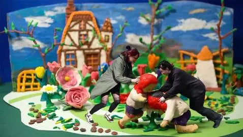 AI Video from prompt: the real people in the photo are tearing the pla