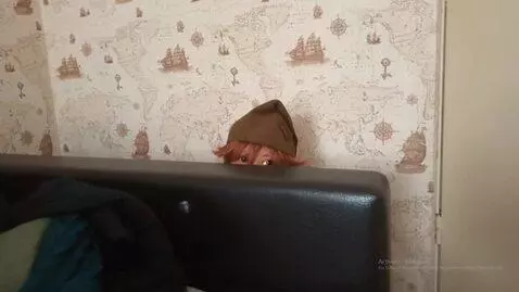 AI Video from prompt: A brownie slowly peeks out from behind the black