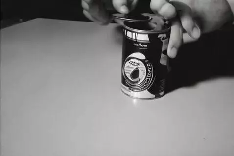 AI Video from prompt: make a commerical for a Can Ace , that opens can