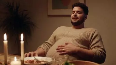 AI Video from prompt: My belly stuffed so much food
