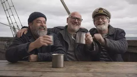 AI Video from prompt: These sailor make a toast a drink happily