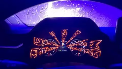 AI Video from prompt: The numbers on the car Dashboard transfors  into