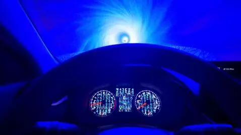 AI Video from prompt: The numbers on the car Dashboard transfors  into
