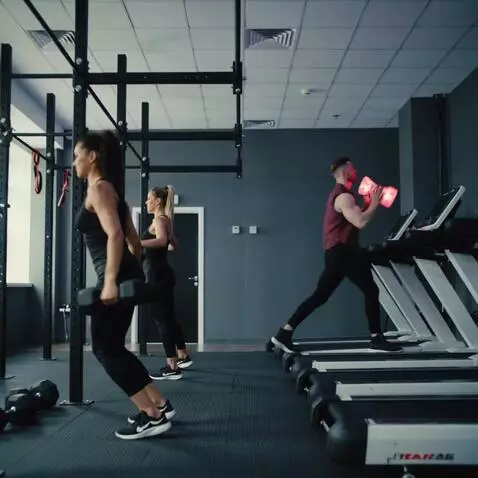 AI Video from prompt: generate a video of a gym and a party club mergi