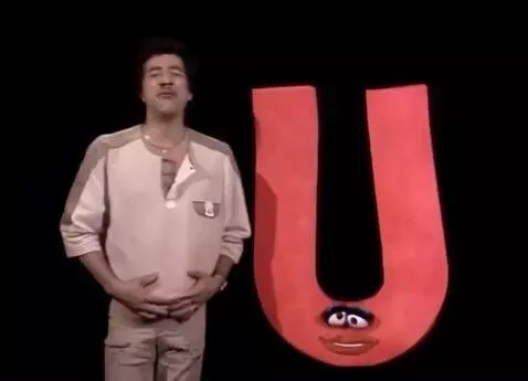 AI Video from prompt: Smokey Robinson shows off his bloating and infla
