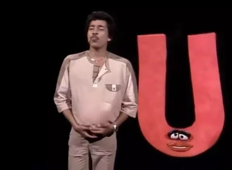 AI Video from prompt: Smokey Robinson shows off his bloating and infla