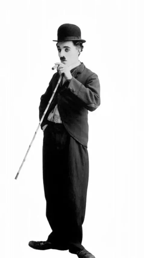 AI Video from prompt: Charlie Chaplin picks up a cigar butt and smokes