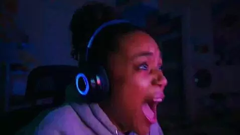 AI Video from prompt: purple girl splaat computer scary maze game jump