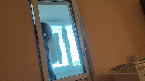 AI Video from prompt: To the right, a scary poltergeist slowly peeks o