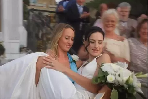 AI Video from prompt: The wedding ceremony as a young blonde woman in 