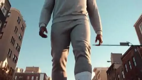 AI Video from prompt: "Cinematic, photorealistic video of a man standi