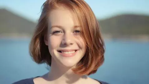 AI Video from prompt: A woman Smiling