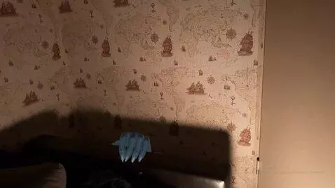 AI Video from prompt: A scary poltergeist slowly crawls out from behin