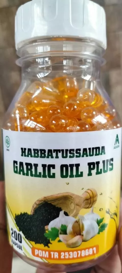 AI Video from prompt: “A cinematic shot of a habbatussauda oil bottle 