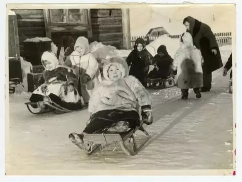AI Video from prompt: Realistic animation: a child rides a sled straig