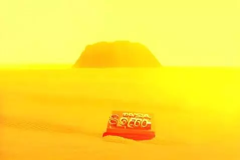 AI Video from prompt: A cinematic yet surreal video set on a sunny bea