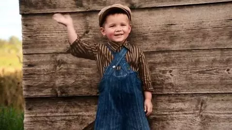 AI Video from prompt: waves his hand and says PRIVET IZ RUDTS