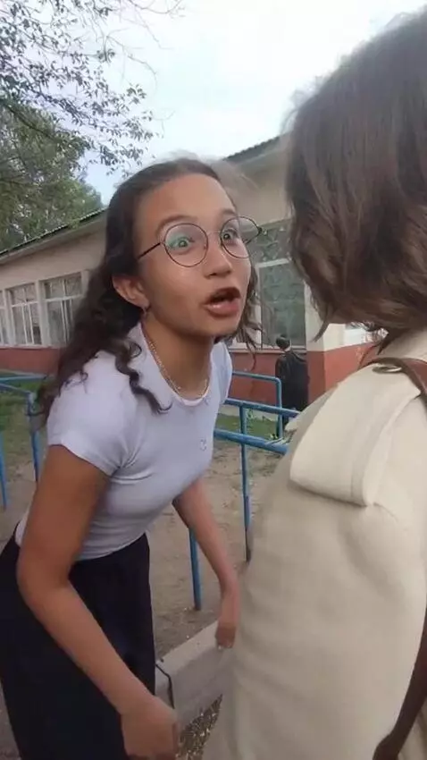 AI Video from prompt: This girl starts speaking quickly in Russian to 