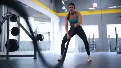 AI Video from prompt: a series clips of an Indian exercise TikTok star