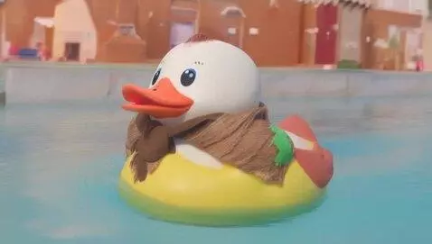 AI Video from prompt: A rubber duck swims in a pool