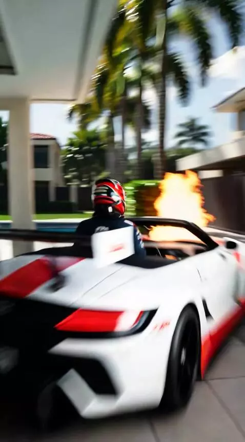 AI Video from prompt: This racer, driving a sports convertible, is rac