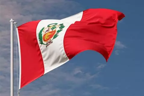 AI Video from prompt: Peruvian flag waving strongly on a tall flagpole