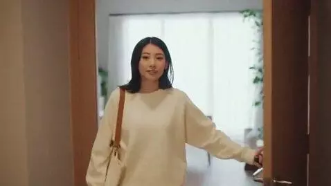 AI Video from prompt: cute asian girl walks into room and says "wanna 