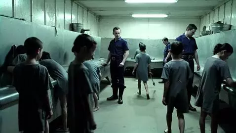 AI Video from prompt: A bunch of barefoot girls in short simple prison
