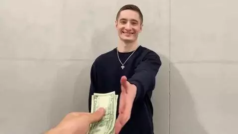 AI Video from prompt: I give this man money, he takes it and starts to