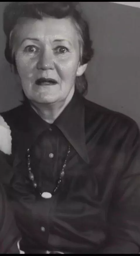 AI Video from prompt: A charming seventy-year-old snow queen with a si