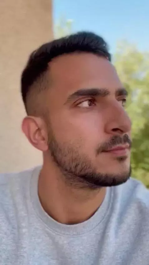 AI Video from prompt: an adult man turns his face to the camera on his