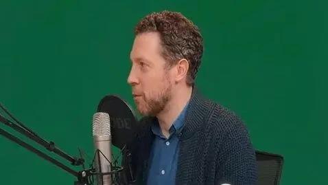 AI Video from prompt: he is actiong like he is listening someone