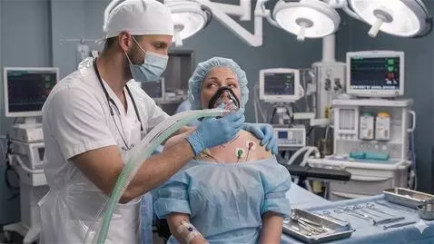 AI Video from prompt: You can hear the female patient trying to breath