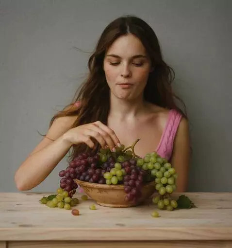 AI Video from prompt: the girl is sitting at the table and tasting the