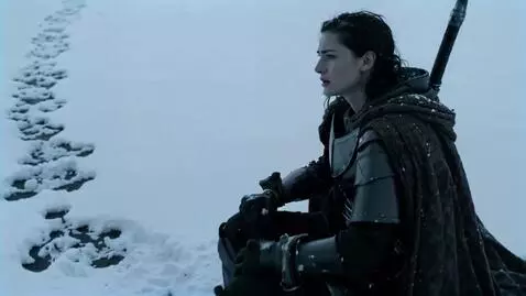 AI Video from prompt: A lone female warrior sitting in deep, pristine 