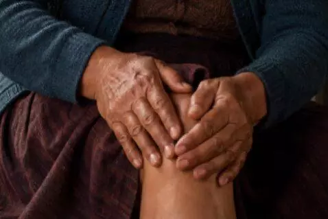 AI Video from prompt: Cinematic close-up of an Andean mother’s hands g