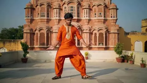 AI Video from prompt: a young indian boy 24-26 dance in jaipur hawamah