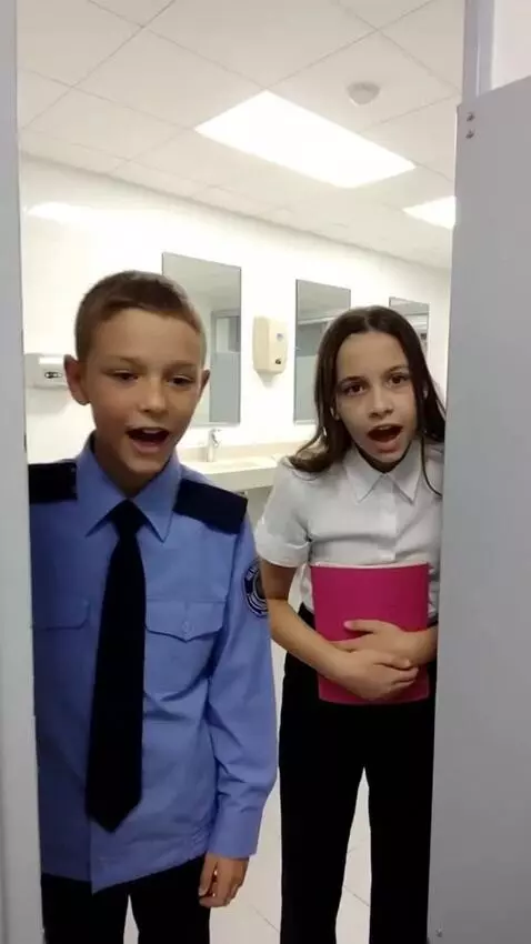 AI Video from prompt: This boy is standing on the toilet and says, "Pe